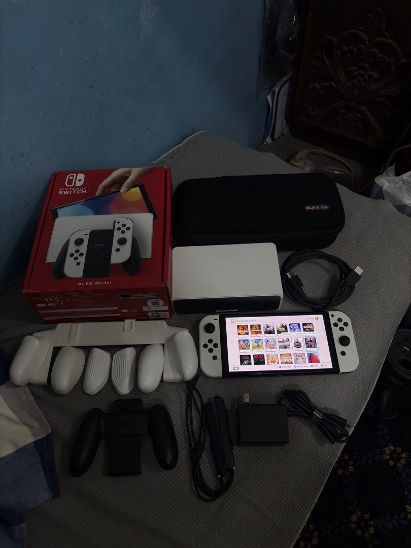 Nintendo Switch OLED with 125 Digital Games (Category: Nintendo) located in Cavite. Submitted by xsavier88 (Listing ID 1465626786, Image 1). Description: 🌟For sale for sale! Nintendo Switch OLED with 125 Digital Games Open for trade sa Nintendo Switch V1/V2/LITE or PS4 add ka cash 11,000 PHP 11,000 PHP 11,000 PHP 🌟INCLUSIONS: Complete with box Carrying pouch (Skull&Co) Neo Grip Set 125 Digital Games (Check the attached images for the list of ga