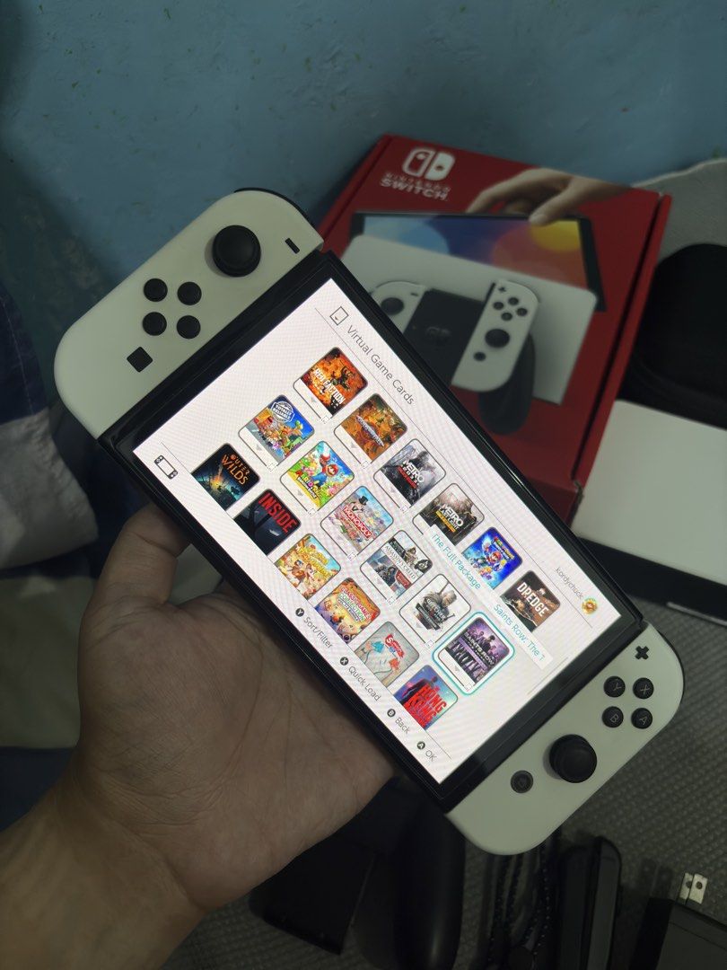 Nintendo Switch OLED with 125 Digital Games (Category: Nintendo) located in Cavite. Submitted by xsavier88 (Listing ID 1465626786, Image 2). Description: 🌟For sale for sale! Nintendo Switch OLED with 125 Digital Games Open for trade sa Nintendo Switch V1/V2/LITE or PS4 add ka cash 11,000 PHP 11,000 PHP 11,000 PHP 🌟INCLUSIONS: Complete with box Carrying pouch (Skull&Co) Neo Grip Set 125 Digital Games (Check the attached images for the list of ga