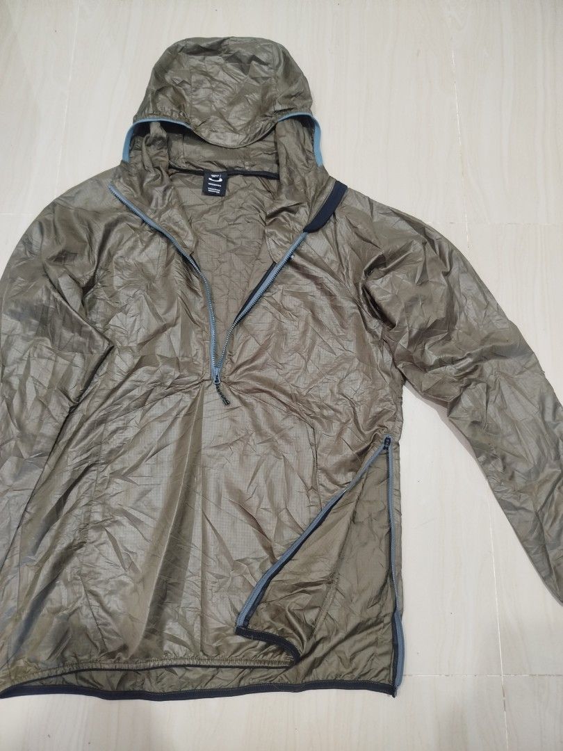 Oakley Enhanced Wind Anorak jacket (Category: Coats, Jackets and Outerwear) located in Aroroy. Submitted by dr0p-a-dr1p (Listing ID 1465647551, Image 2). Description: Width: 21 Length l: 27 - Brand: Oakley - Color: Olive green - Size/Fit: M to L - Material: Durable ripstop fabric - Features: Half-zip front closure, attached hood, and side zipper for easy wear and ventilation - Origin: Made in Vietnam - Ideal for: Outdoor runs or breezy weather la