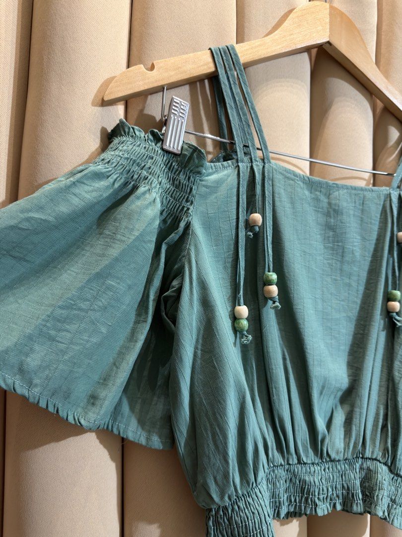 Off Shoulded Croptop (Category: Others Tops) located in Manila. Submitted by glamstylemnl (Listing ID 1465635715, Image 2). Description: ♡ SIZE: S ♡ BUST: 34 ♡ Swipe left to see the actual color & details ♡ decorative bead accents / double straps / mocked hem ♡ HQ • 10/10 ♡ Ready to wear 👚.