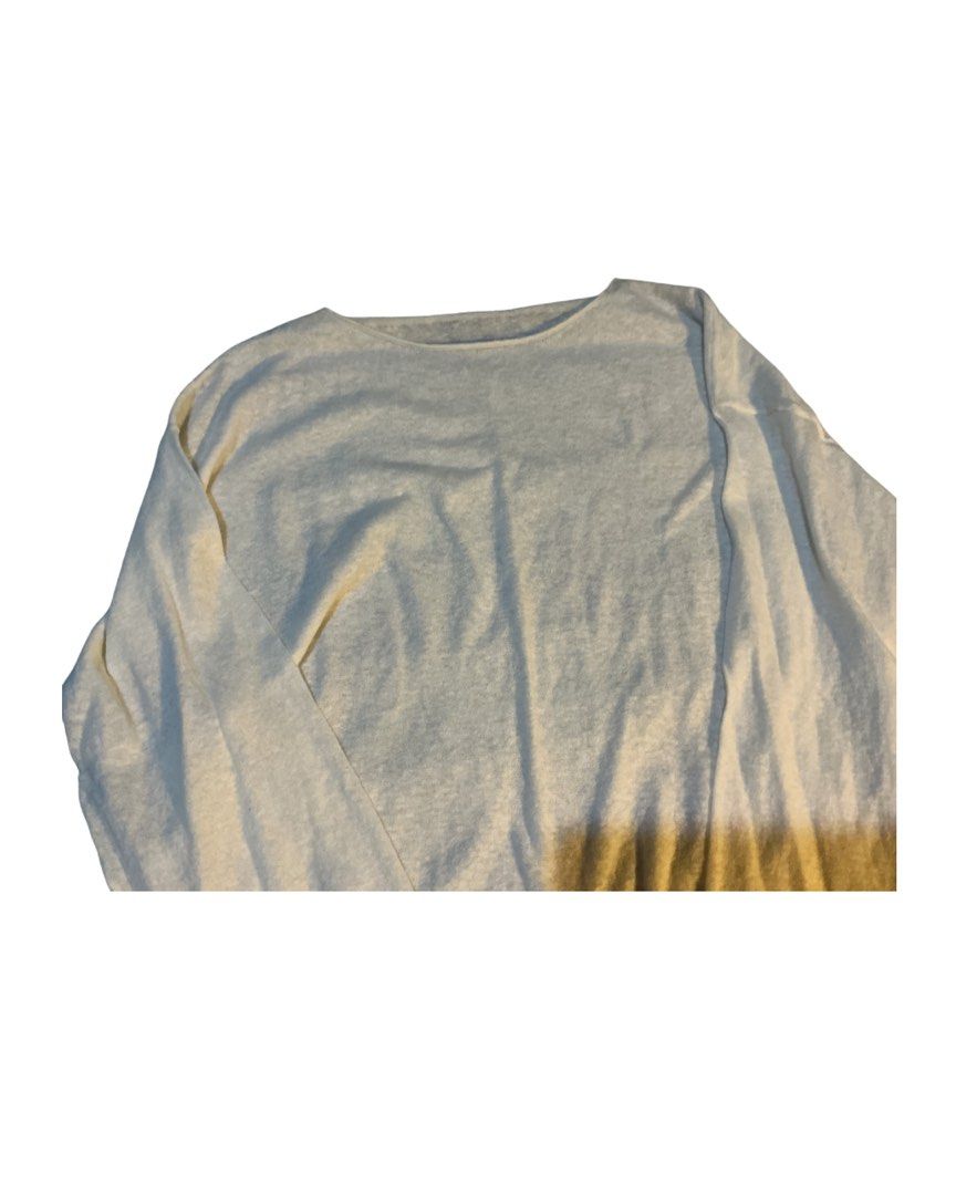 Off-white long sleeve lightweight knit sweater top (Category: Longsleeves) located in Bulacan. Submitted by whimsylilies (Listing ID 1465669462, Image 2). Description: - Color: Off-white / Cream - Material: Lightweight, soft knit - Fit: Loose, comfortable, relaxed dropped shoulders - Neckline: Simple round neck - Style: Versatile basic for easy pairing with jeans or skirts - Condition: Brand new / Excellent (ready to wear) - See through, M-L size