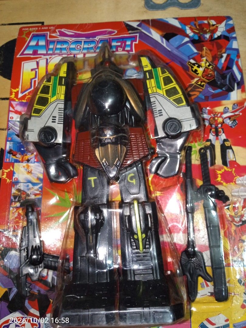 Old Toy Aircraft Fighter (Local) (Category: Vintage Collectibles) located in Davao. Submitted by banana.pancake (Listing ID 1465584090, Image 2). Description: Vintage Robot Toy Old stock but still brand new and sealed. 6-7inches Sealed copy. Loose copy is not for sale.