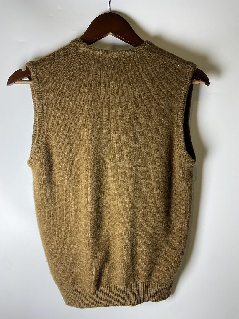 Olive brown button vest with pockets (Category: Others Tops) located in Makati City. Submitted by indaysukaycloset (Listing ID 1465645313, Image 3). Description: OLIVE BROWN BUTTON VEST WITH POCKETS Brand: ALDRIDGE Size: Free Size / Fits s-M Color: Olive Brown / Khaki Brown Details: - V-neck button-down vest cardigan - Front button closure (4 buttons) - 2 front patch pockets with ribbed trim - Ribbed hem and armholes - Soft knit, makapal, old mon