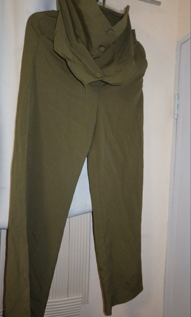 Olive Green Tube Coordinates/Terno (Category: Sets or Coordinates) located in Cavite. Submitted by mcjkim (Listing ID 1465704608, Image 1). Description: - Color: Olive green - Size: Fits small to medium frame - Condition: Like new, worn 3 times only - Material: Lightweight, textured fabric with a smocked back panel for extra stretch - Occasion: Ideal for evening outings, rooftop dinners, or weekend hangouts.