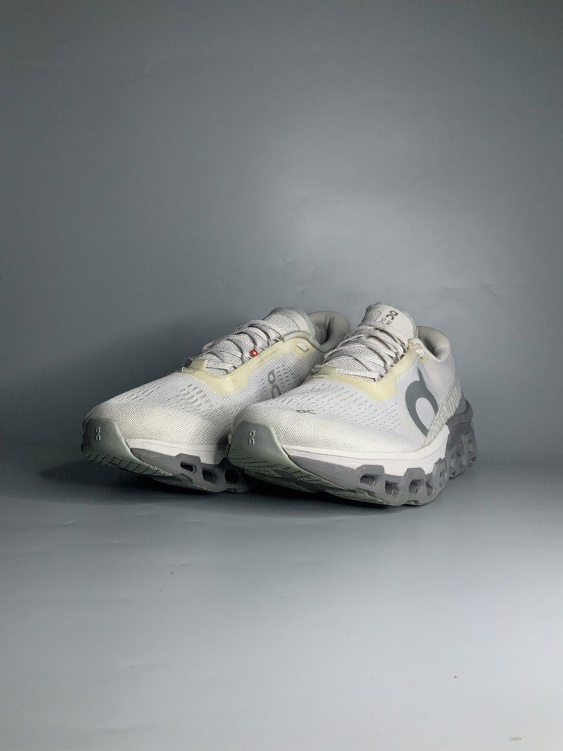 On Cloudmonster 2 Frost|Rock (Category: Sneakers) located in Cavite. Submitted by kalye_footwear (Listing ID 1465714495, Image 3). Description: - Brand: OnRunning - Model: Cloudmonster 2 - Colorway: Frost|Rock (White and Grey) - Size : Us 10 , Euro 44, Cm 28 - Features: Signature CloudTec sole for max cushioning, breathable mesh upper, secure lace-up closure - Best for: Daily miles, long walks, and running - Design: Swiss-engineered with an iconi