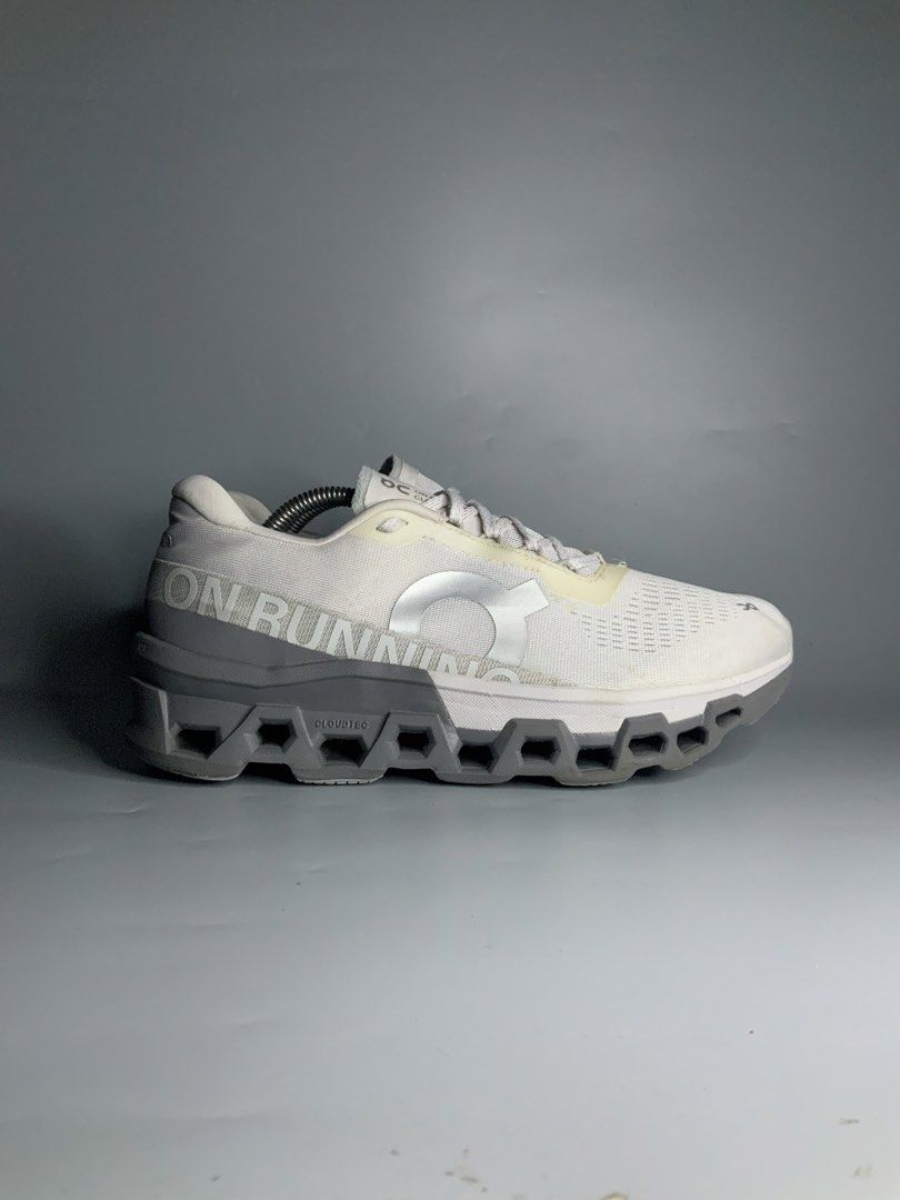On Cloudmonster 2 Frost|Rock (Category: Sneakers) located in Cavite. Submitted by kalye_footwear (Listing ID 1465714495, Image 2). Description: - Brand: OnRunning - Model: Cloudmonster 2 - Colorway: Frost|Rock (White and Grey) - Size : Us 10 , Euro 44, Cm 28 - Features: Signature CloudTec sole for max cushioning, breathable mesh upper, secure lace-up closure - Best for: Daily miles, long walks, and running - Design: Swiss-engineered with an iconi