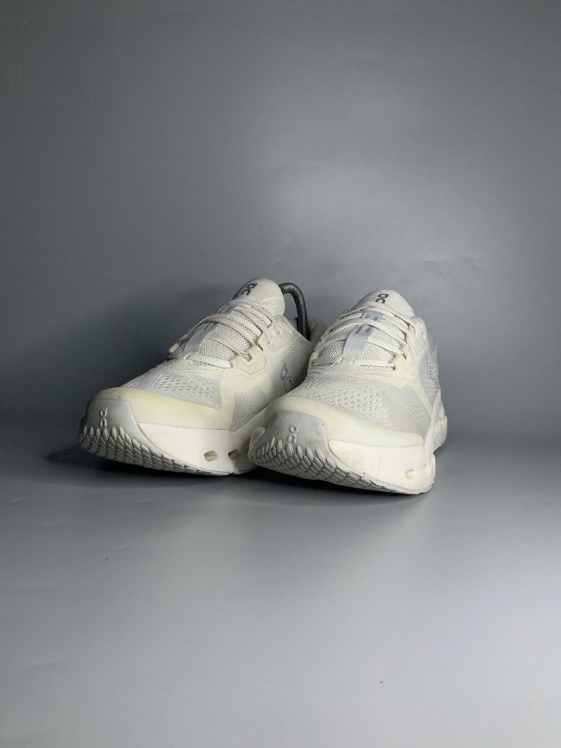 On CloudRunner 3 (Category: Sneakers) located in Cavite. Submitted by kalye_footwear (Listing ID 1465713928, Image 3). Description: - Brand/Model: On CloudRunner 3 - Color: Crisp White with Swiss flag detail - Size : Us 8 , Euro 41 , Cm 26 - Key Features: Chunky Helion superfoam sole, CloudTec cushioning, breathable mesh upper, and silver reflective accents - Condition: Pre-loved with minor signs of wear around the sole edges and toe guard - Incl