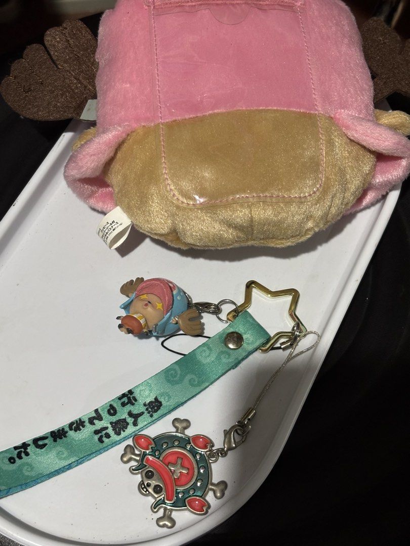 One Piece Chooper Keychain/Bagcharm bundle (Category: Other Merchandise) located in Manila. Submitted by pmpmprn (Listing ID 1465625371, Image 2). Description: Authentic One Piece Chopper Keychain and Wallet/Card Holder sold as set only. As is condition.