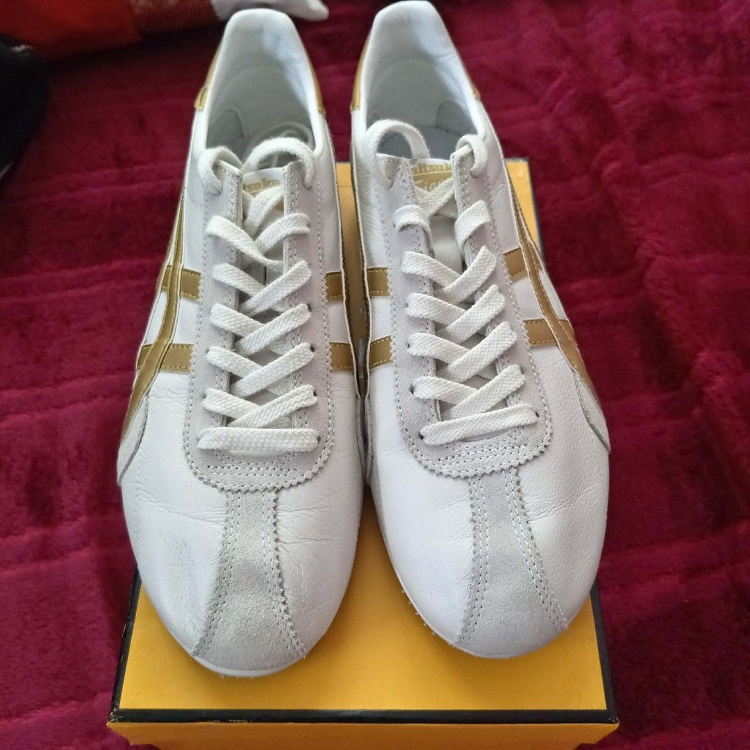 Onitsuka tiger runspark white gold (Category: Sneakers) located in Cavite. Submitted by butterflyvx (Listing ID 1465610841, Image 2). Description: ‎Size: 26.5 cm / EU 42 / US 8.5 / UK 7.5 ‎ ‎RFS: decluttering, dalawang beses lang nagamit tapos natambak na but still in good condition ‎ ‎• No original box or receipt, shoes only kasi natapon na. Still in a good condition ‎• Please check all photos carefully for the actual condition ‎ ‎Price: ₱5,000 