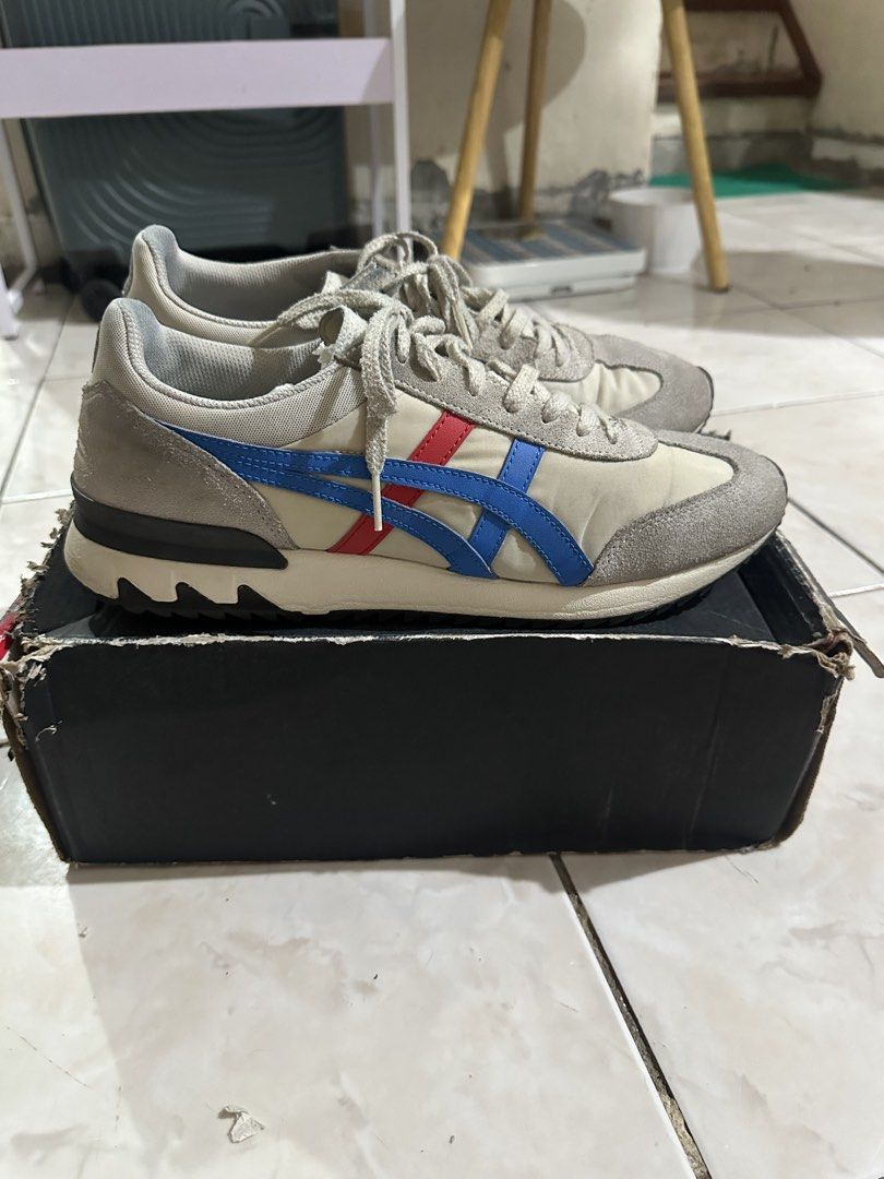 Onitsuka Tiger Sneakers Size US 10 / EU 44 (Category: Sneakers) located in Paranaque City. Submitted by fuckthepatriarchy (Listing ID 1465702553, Image 3). Description: - Brand/Model: Onitsuka Tiger Sneakers - Colorway: Cream, Blue, and Red - Size: US 10 / EU 44 / CM 28.0 - Material: Suede and mesh upper for breathability and style - Condition: Pre-loved, minor creasing, dirt on soles, comfortable for daily use - Packaging: Original box included 