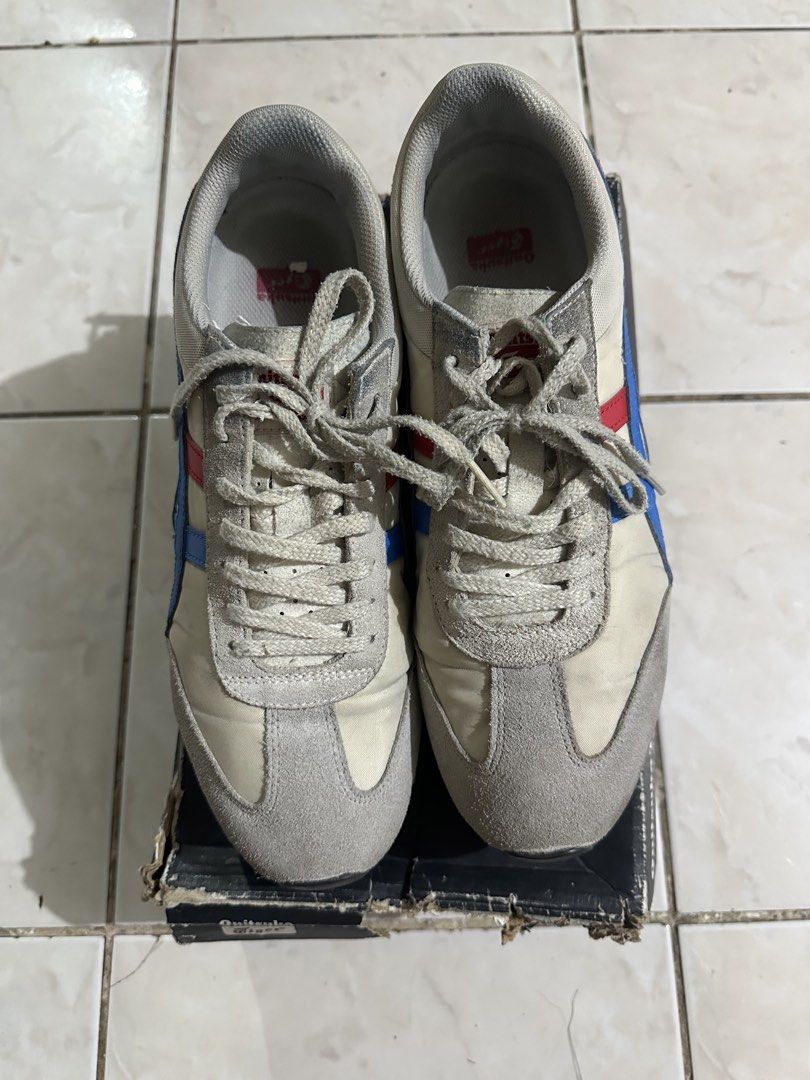 Onitsuka Tiger Sneakers Size US 10 / EU 44 (Category: Sneakers) located in Paranaque City. Submitted by fuckthepatriarchy (Listing ID 1465702553, Image 1). Description: - Brand/Model: Onitsuka Tiger Sneakers - Colorway: Cream, Blue, and Red - Size: US 10 / EU 44 / CM 28.0 - Material: Suede and mesh upper for breathability and style - Condition: Pre-loved, minor creasing, dirt on soles, comfortable for daily use - Packaging: Original box included 