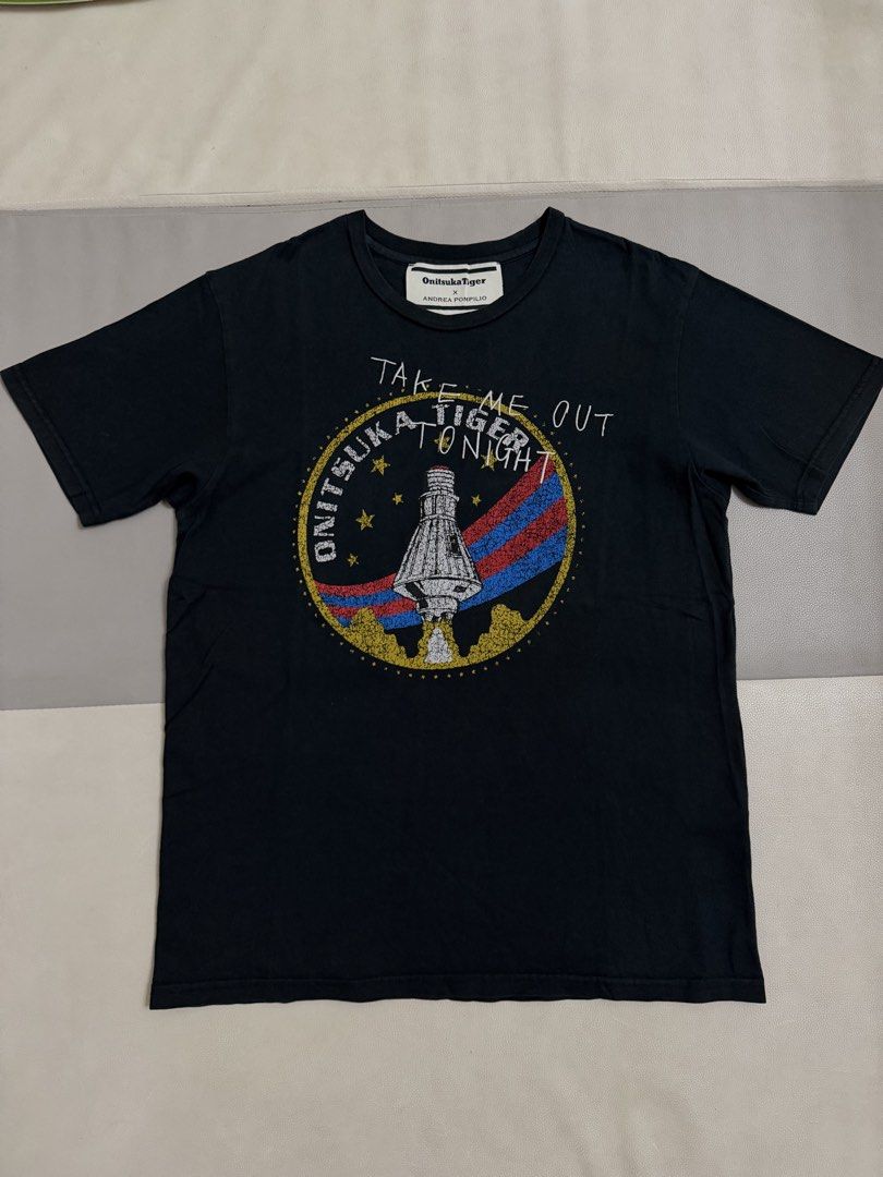 Onitsuka Tiger T-Shirt (Category: Tshirts & Polo Shirts ) located in Quezon City. Submitted by vaniefiel (Listing ID 1465747016, Image 1). Description: - Brand: Onitsuka Tiger x Andrea Pompilio - Item: Graphic Tee - Color: Black with space capsule graphic and 'Take Me Out Tonight' lettering - Size: L on tag - Check the pictures for actual size dimensions - Material: 100% cotton Location: Batasan Hills, QC Message me for more details! Thanks.