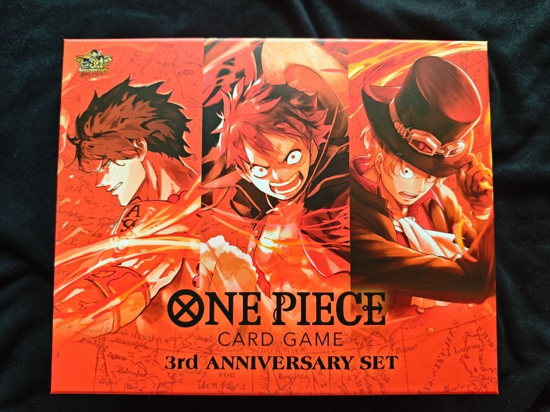 OPTCG 3rd Anniversary Set (Japanese) – Complete (Category: Card Boxes & Cases) located in Caloocan City. Submitted by deathlessmile (Listing ID 1465661802, Image 1). Description: Complete set, outer box opened only to verify contents, all inner items still sealed in original plastic. Thin manga-panel paper insert has 2 small creases from shipping. Open to reasonable offers. Meetup: SM North EDSA / Trinoma. Shipping: Lalamove or LBC. Payment: GCas