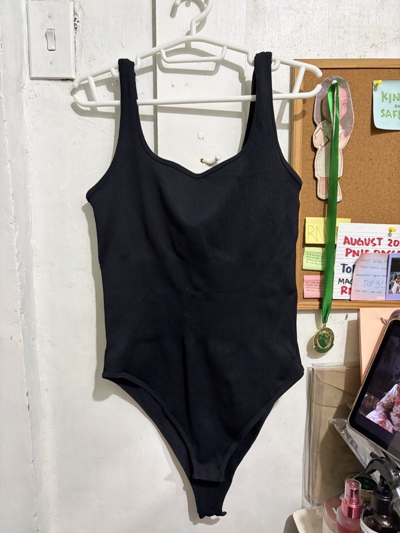 OQQ Black Bodysuit (Category: Others Tops) located in Quezon City. Submitted by berrystrawng (Listing ID 1465684887, Image 1). Description: .