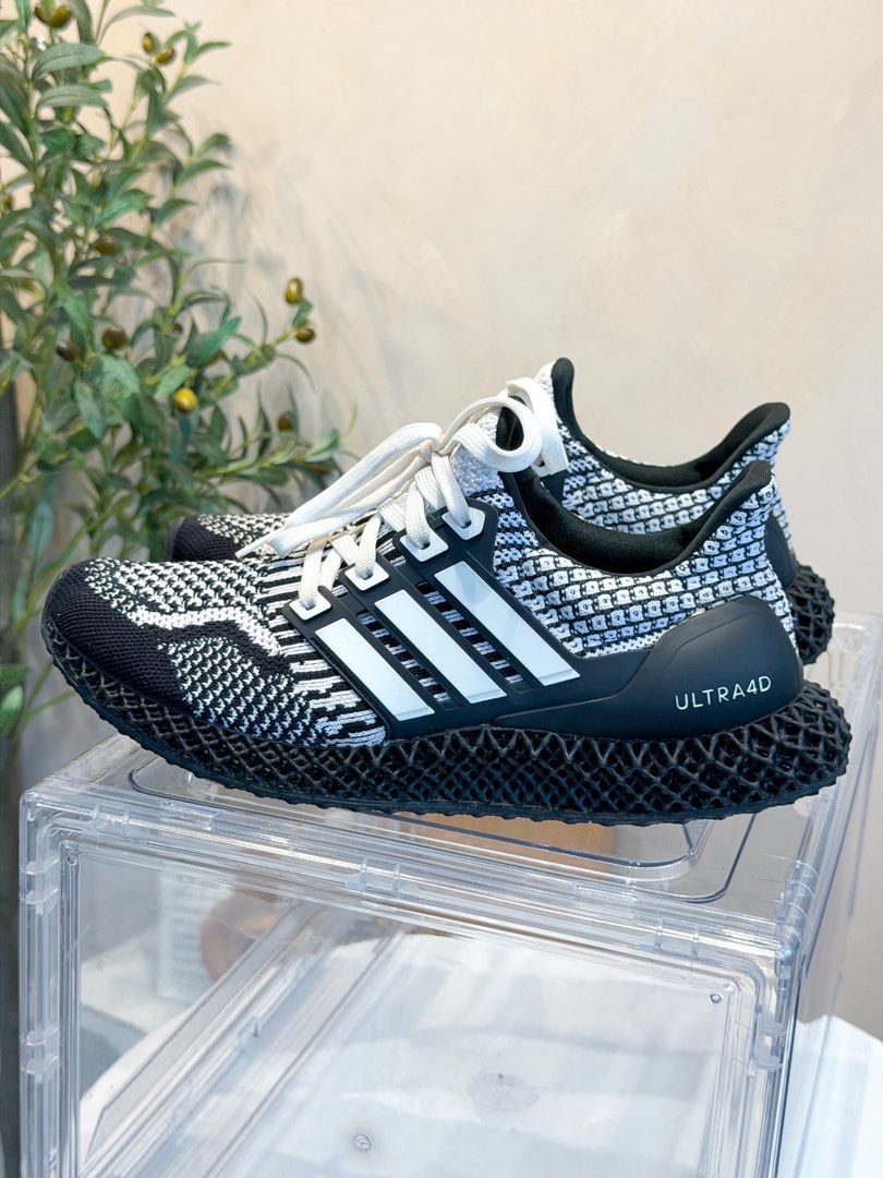 Original Adidas Ultra 4D Boost OREO Cookies (Category: Sneakers) located in San Pedro. Submitted by maylynart09522 (Listing ID 1465659397, Image 3). Description: Original Adidas Ultra 4D Boost OREO Cookies • size 8 (us) • used, pero matagal to nakastock lang sa acrylic box • no box included • free acrylic box • 8/10 condition, issue crack na yung logo sa may front, yun lang ang issue nya other than that bagong bago pa ₱7,500 + shipping fee (sligh