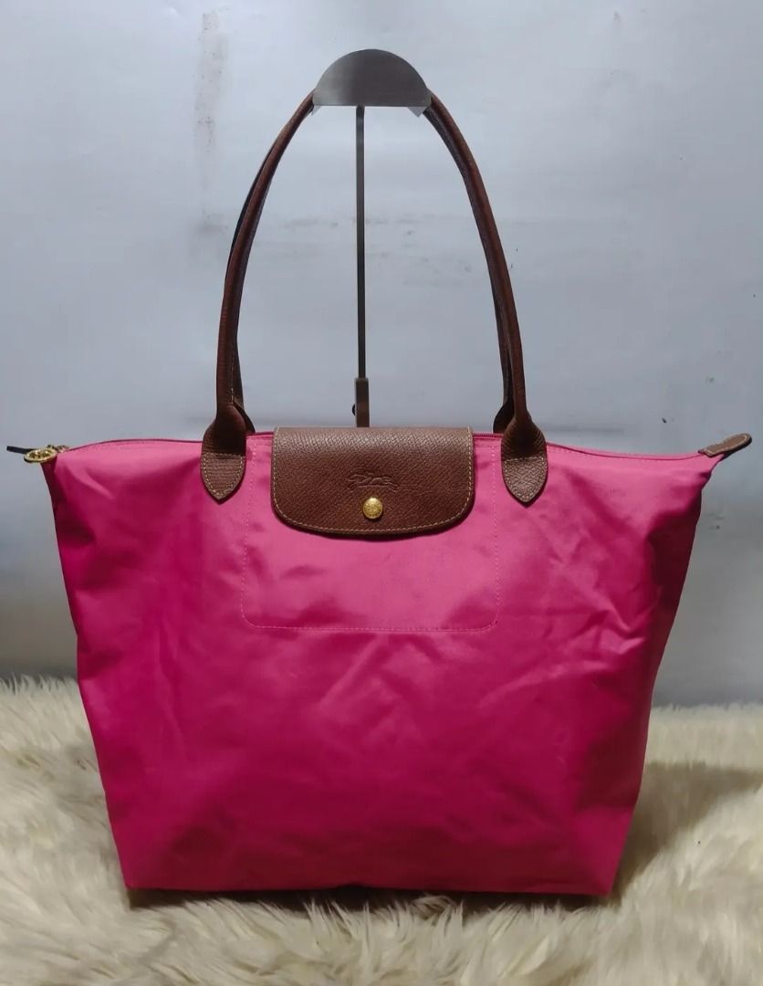 Original LONGCHAMP LLH (Category: Shoulder Bags) located in Cabuyao City. Submitted by your____lux____shop (Listing ID 1465688730, Image 1). Description: Sale❗️Sale❗️Sale❗️ ₱2,299 Original LONGCHAMP Preloved Large Long Handle Nylon/genuine leather trim 📌First to pay!.
