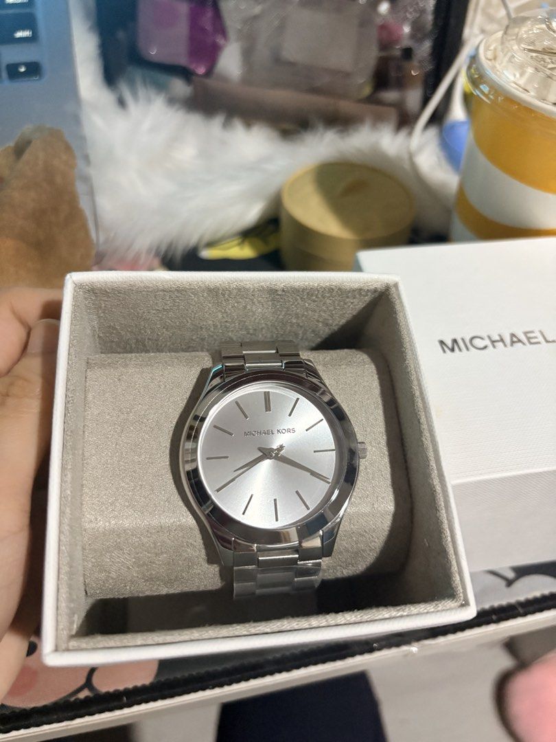 Original Michael Kors Runway Classic Silver Watch (Category: Luxury Watches) located in Bacolod City. Submitted by atelier__maria.ph (Listing ID 1465751847, Image 2). Description: Brand new bought for PHP 15,000 Still negotiable .