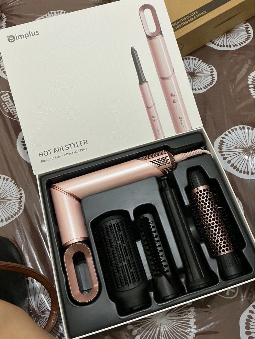 Original Simplus 5-in-1 Hair Blower Styler (Category: Hair) located in Manila. Submitted by geraldinea70970 (Listing ID 1465718892, Image 2). Description: 2 months old only. I rarely use it so good as new siya (complete tools and with box) RFS: Need funds.
