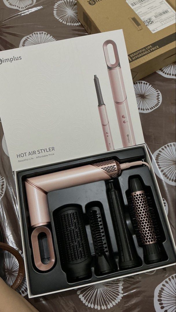 Original Simplus 5-in-1 Hair Blower Styler (Category: Hair) located in Manila. Submitted by geraldinea70970 (Listing ID 1465718892, Image 1). Description: 2 months old only. I rarely use it so good as new siya (complete tools and with box) RFS: Need funds.
