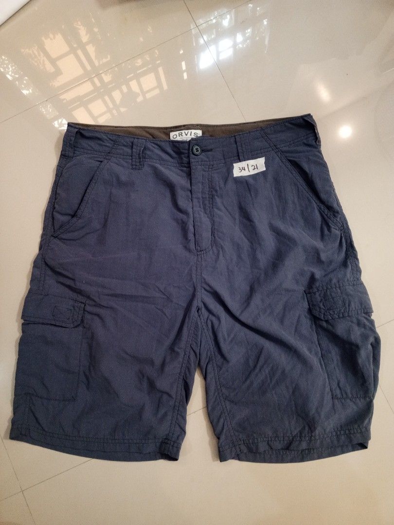 Orvis Classic Collection Cargo Shorts Size 32 Navy Blue (Category: Shorts) located in Orani. Submitted by thriftniea (Listing ID 1465651972, Image 1). Description: - Brand: Orvis - Style: Classic Collection cargo shorts - Condition: Brand new with tags attached - Size: 32 waist - Color: Navy Blue - Features: Multiple utility pockets on sides and front, button fly closure - Ideal for: Casual outdoor wear and everyday use.
