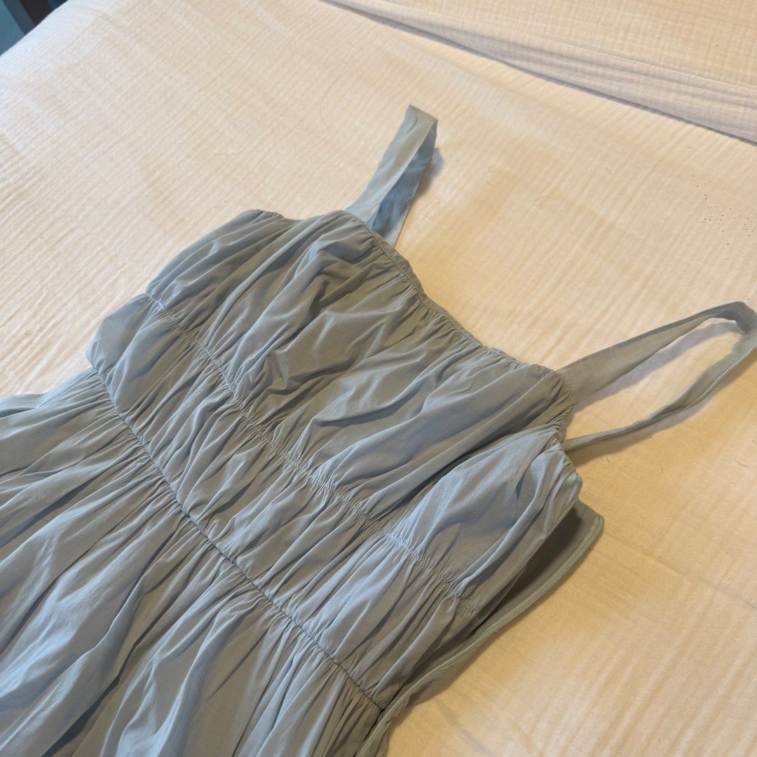 Our Second Nature light blue midi dress size S (Category: Dresses) located in Manila. Submitted by vea1992 (Listing ID 1465639281, Image 2). Description: - Brand: Our Second Nature - Color: Light Blue - Size: S - Design: Smocked bodice with textured fabric and flowy skirt - Closure: Convenient side zipper - Details: Chic shoulder straps - Condition/Vibe: Great everyday piece, comfortable and stylish.
