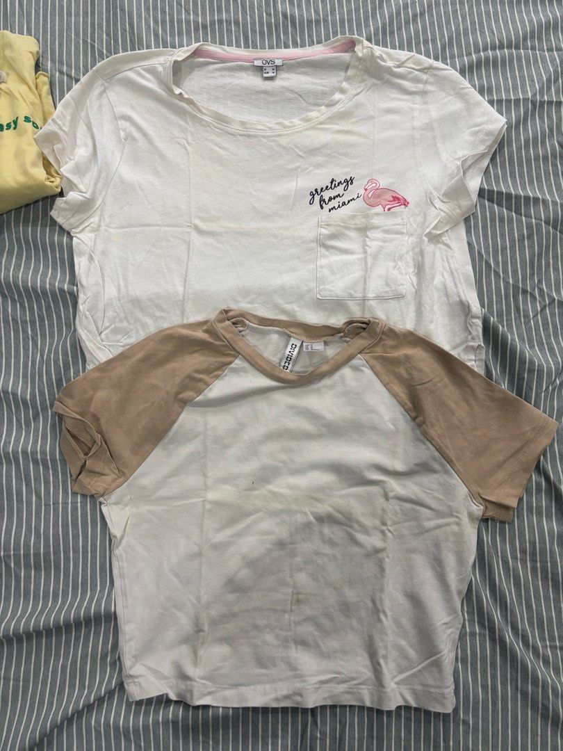 OVS and Divided Cropped Shirt (Category: Shirts) located in San Pablo. Submitted by loved.goods0501 (Listing ID 1465643094, Image 1). Description: Bundle includes 2 casual t-shirts (Size M) Top 1: White OVS tee Top 2: Divided raglan crop top Material: Comfortable, breathable cotton fabric.