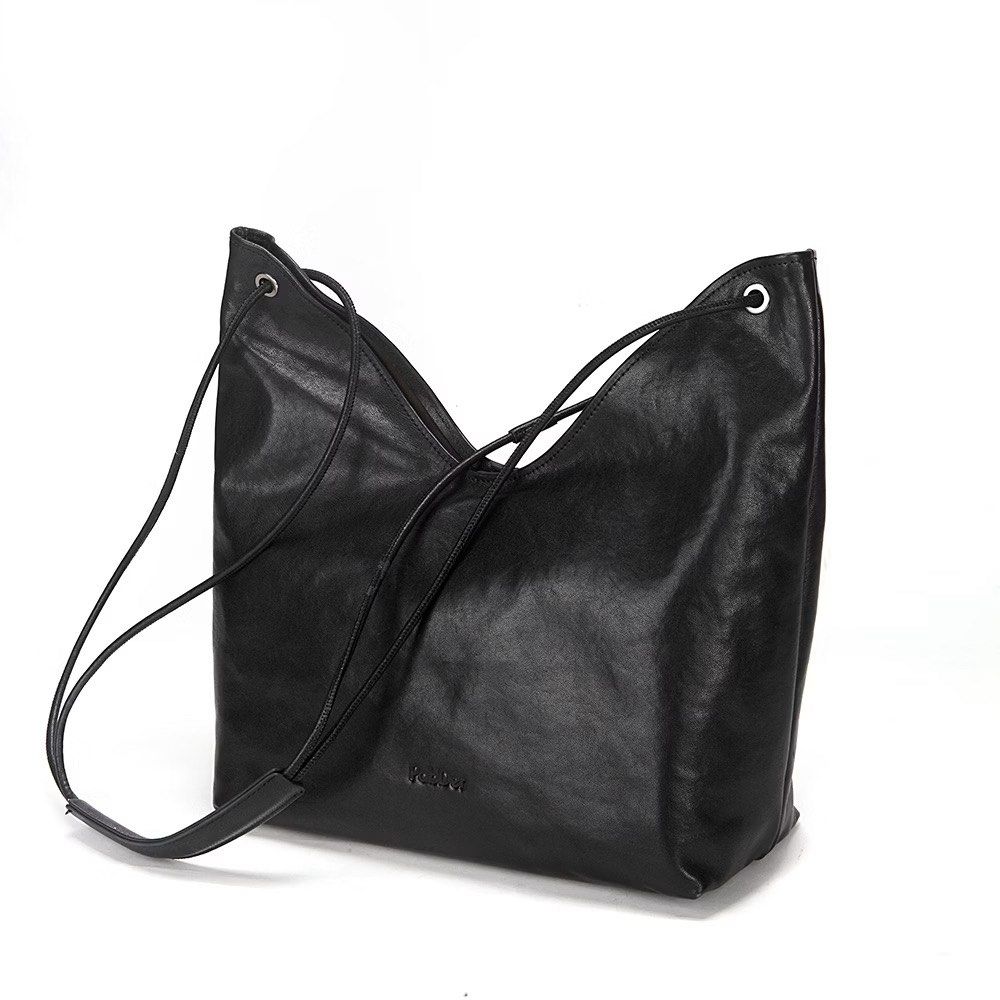 Pabder U-shaped Lambskin leather shoulder bag (Category: Shoulder Bags) located in Manila. Submitted by jmb09 (Listing ID 1465707430, Image 3). Description: slouchy bag, genuine leather Rfs: used 3 times only; will buy another pabder bag.