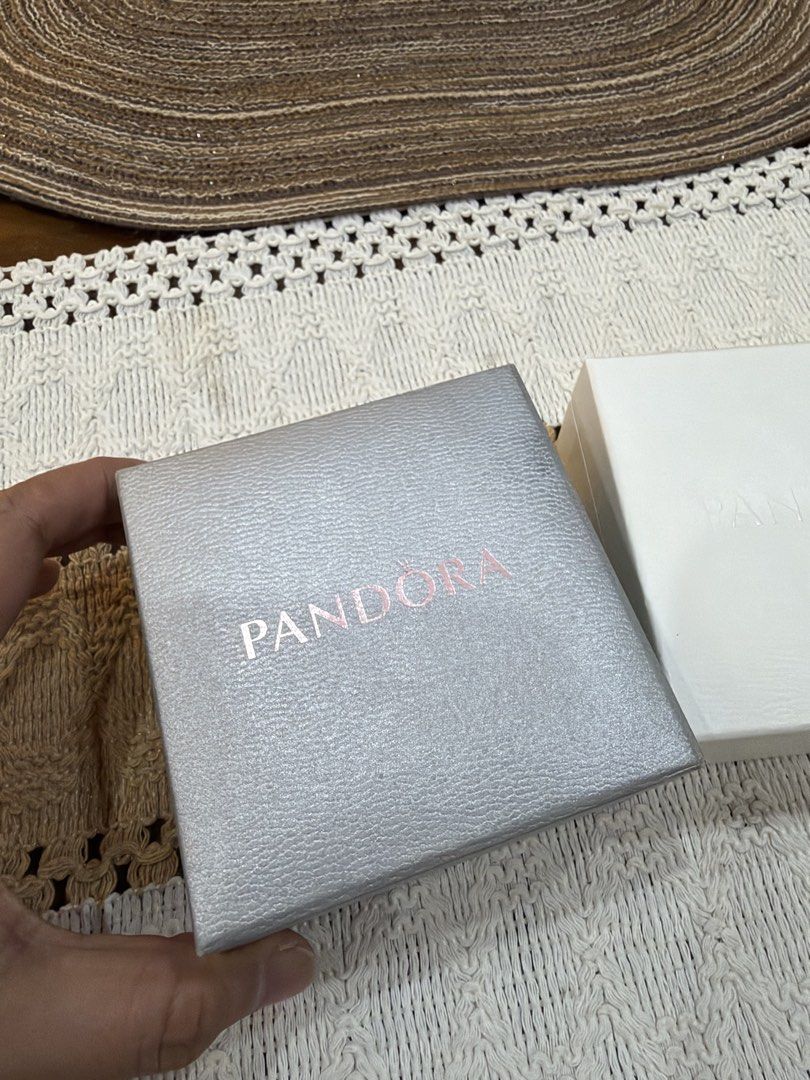 Pandora Bracelet Boxes Set of Three (Category: Accessory Holder, Box & Organizers) located in Lipa City. Submitted by michellesclosetph (Listing ID 1465658609, Image 2). Description: *With purchase worth 300 up - Authentic Pandora boxes (Set of 3: silver, white, beige) - Plush black velvet interior lining - Perfect for storing rings or small trinkets - Ideal for gifting or organization.