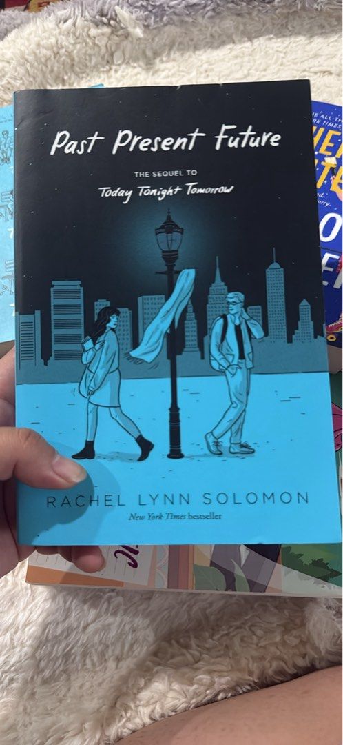 Past Present Future by Rachel Lynn Solomon paperback (Category: Storybooks) located in Butuan. Submitted by shania439 (Listing ID 1465596185, Image 1). Description: - Title: Past Present Future by Rachel Lynn Solomon - Series: Sequel to Today Tonight Tomorrow - Format: Paperback with blue cityscape cover art - Condition: Clean pages, minimal shelf wear along the edges - Genre: Great contemporary romance read.