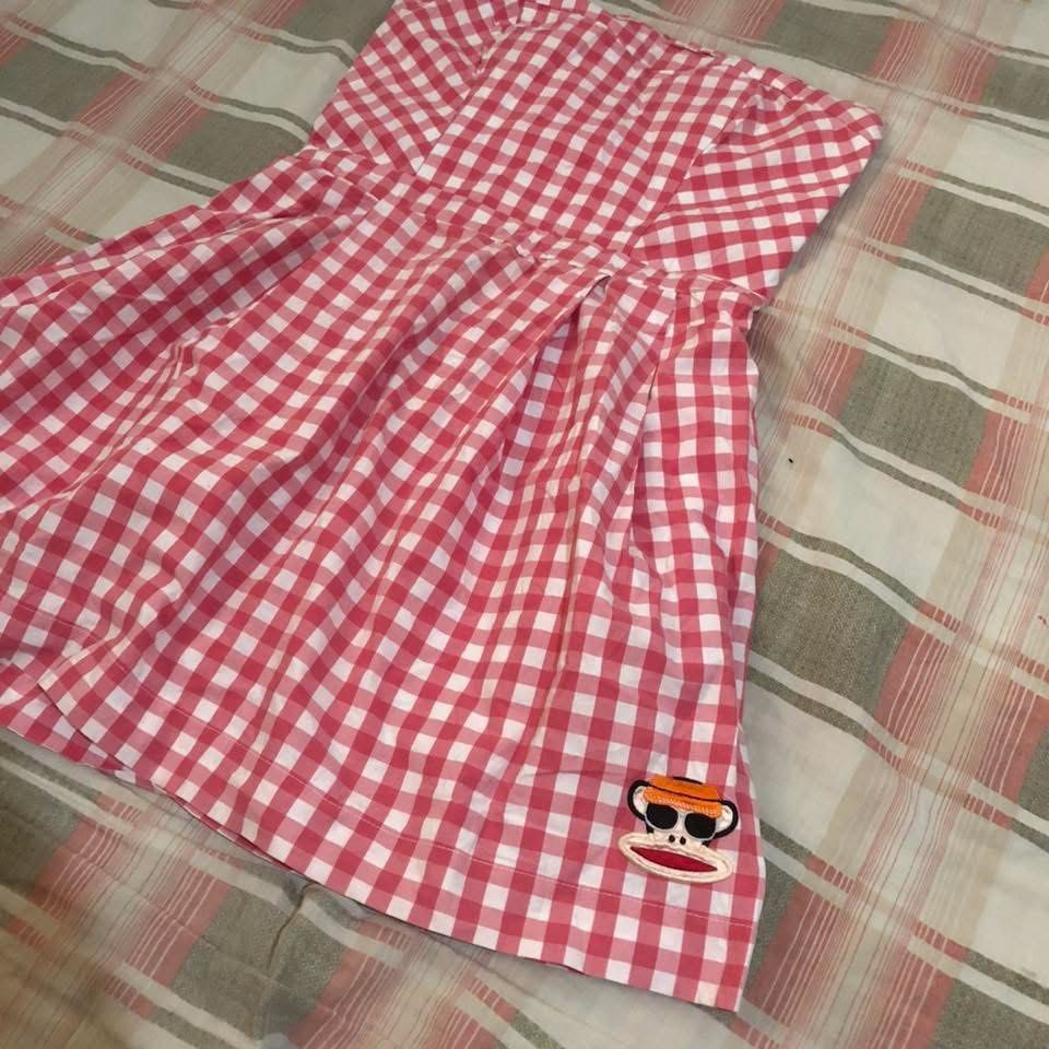 Paul Frank Pink Gingham Strapless Dress (Category: Dresses) located in Caloocan City. Submitted by yukimaruu2 (Listing ID 1465751924, Image 2). Description: - Pink and white gingham strapless mini dress - Sweetheart neckline with fitted bodice and flared skirt - Features an authentic Paul Frank Julius monkey patch wearing sunglasses and a visor on the bottom hem - Great streetwear piece for casual outings or warm weather days - Condition: Excelle