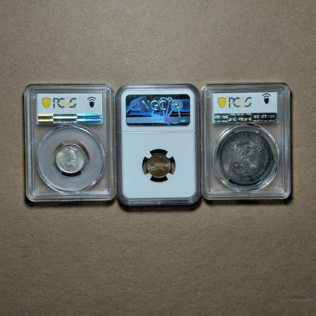 PCGS/NGC Graded Coins (Category: Currency) located in Tagbilaran City. Submitted by bennycollectibles (Listing ID 1465746016, Image 2). Description: •PCGS MS 64 Apolinario Mabini 1 Peso coin - 6k •PCGS AU 55 USPI 20 Centavos Coin - 2k •NGC MS 65 BN USPI ½ Centavo Coin - 10k •Free Shipping •16,500 if take all.