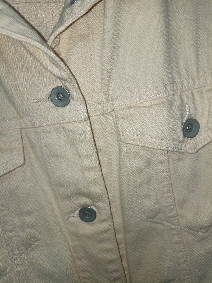 Uniqlo Peach pink denim jacket button up outerwear (Category: Coats, Jackets and Outerwear) located in Quezon City. Submitted by closeta38 (Listing ID 1465583364, Image 3). Description: - Peach pink denim jacket with a solid pastel tone - Button-up front with matching metal buttons - Two chest pockets with flaps and convenient side welt pockets - Long sleeves with adjustable buttoned cuffs - Structured collar and classic fit - Perfect layering pi