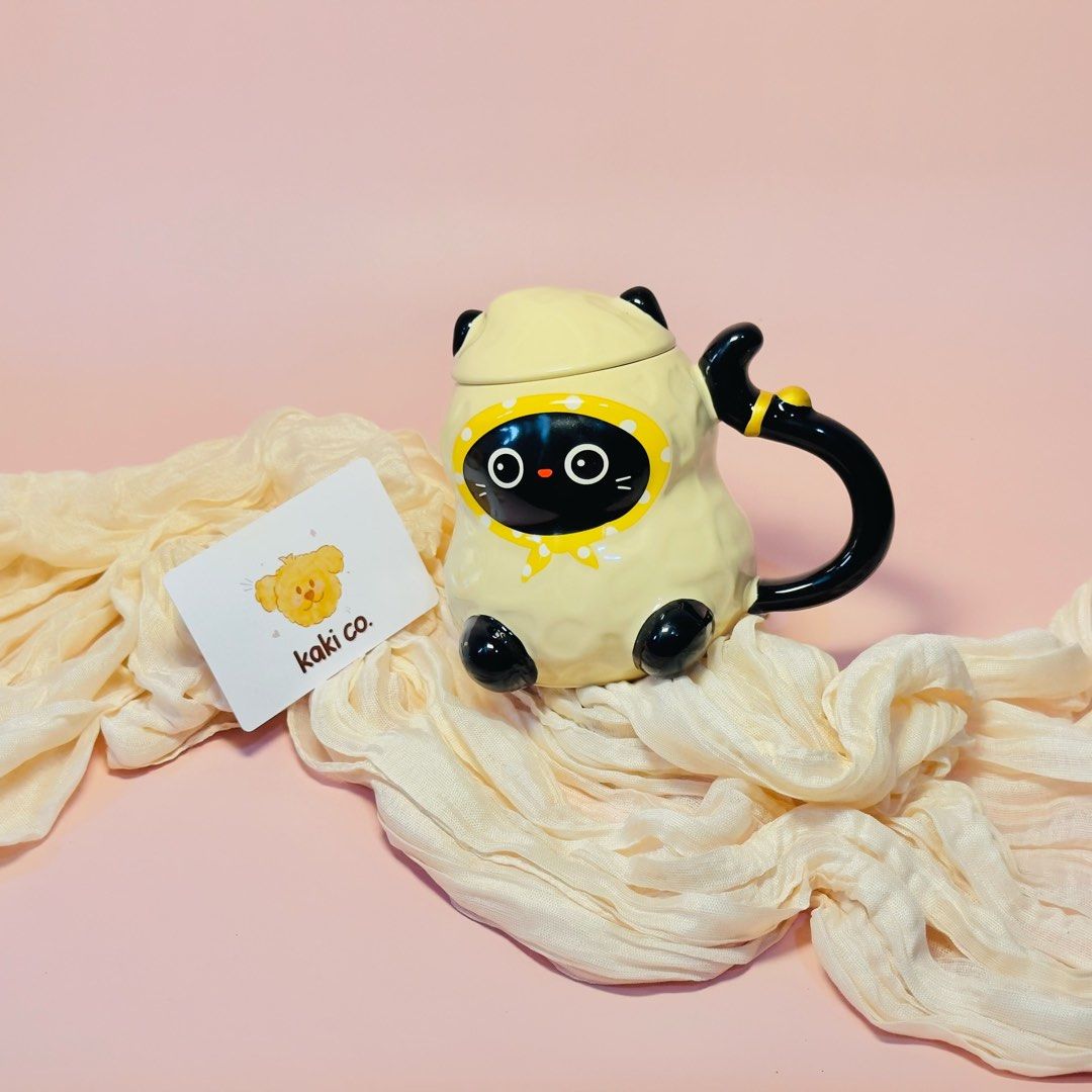 Peanut-style Cat Mug (Category: Coffee & Tea Tableware) located in Dasmarinas. Submitted by kakis.collections (Listing ID 1465759070, Image 1). Description: .