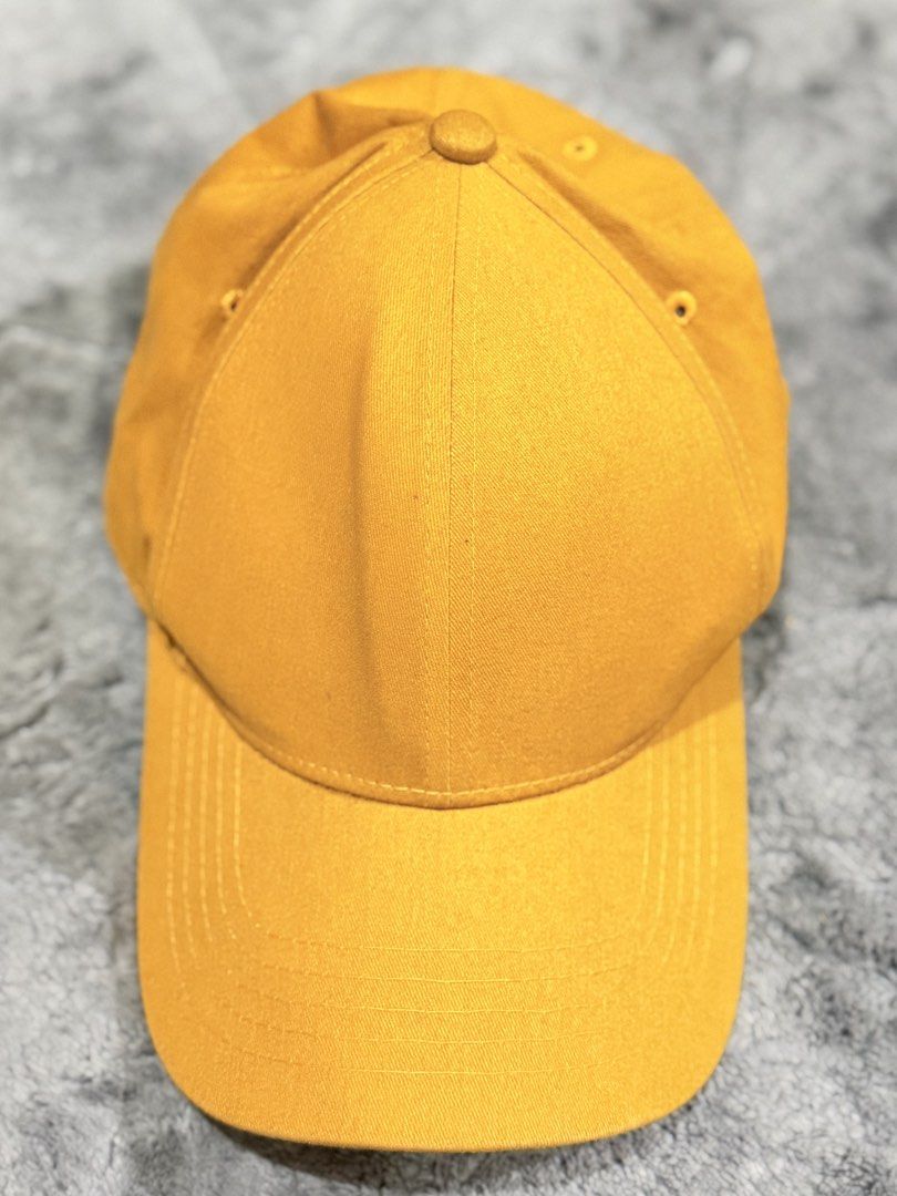 Penshoppe Mustard Yellow Baseball Cap Medium (Category: Caps & Hats) located in Tagaytay City. Submitted by belletrendss (Listing ID 1465649925, Image 1). Description: - Brand: Penshoppe - Color: Mustard yellow - Size: Medium - Design: Classic six-panel with embroidered eyelets - Brim: Curved - Details: Black inner sweatband with contrasting yellow stitching - Fit: Adjustable back strap Location: Tagaytay/Silang Free shipping for above 1k orders 