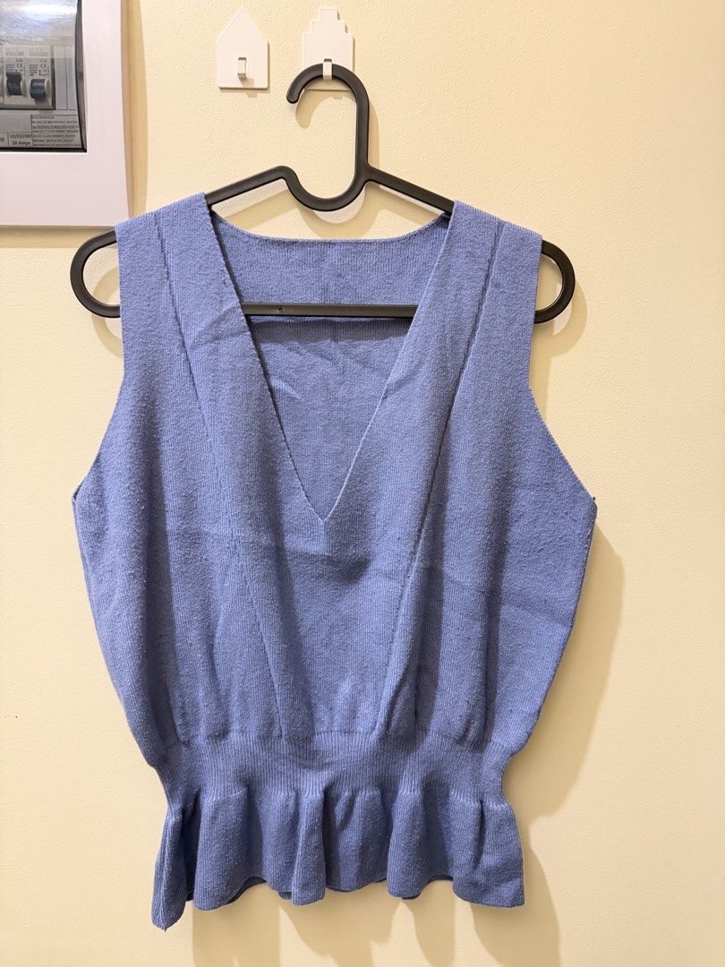 Peplum V-neck Vest (Category: Sleeveless) located in Manila. Submitted by xmagic.shopx (Listing ID 1465664469, Image 1). Description: .
