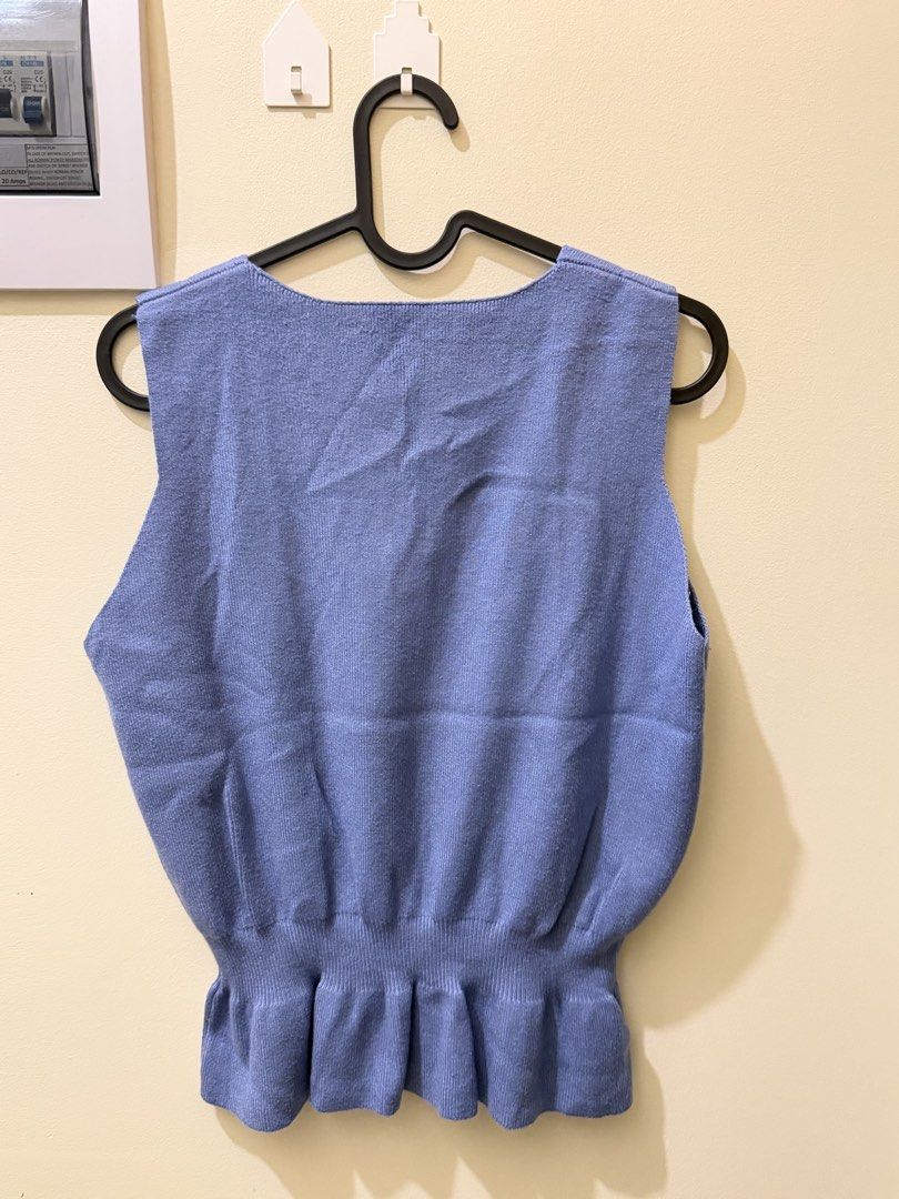 Peplum V-neck Vest (Category: Sleeveless) located in Manila. Submitted by xmagic.shopx (Listing ID 1465664469, Image 3). Description: .