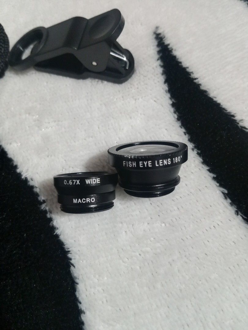 Phone Lens Kit (Wide, Macro, Fish Eye) (Category: Other Mobile & Gadget Accessories) located in Valencia. Submitted by lj.roomfinds (Listing ID 1465667477, Image 3). Description: • RFS: di ginagamit kasi may digi cam si owner, naka store lang sa pouch palagi ang kit • comes with original drawstring pouch • no scratches on lens • compatible for any phone.