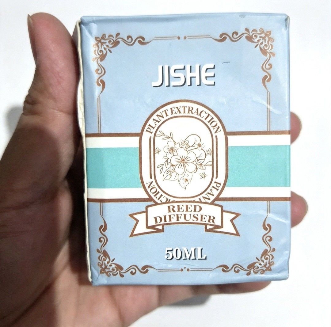 Plant Extraction Reed Diffuser Ocean Scent (Category: Home Fragrance) located in Quezon City. Submitted by ana-chan (Listing ID 1465635975, Image 1). Description: - Brand: JISHE - Variant: Ocean Scent - Capacity: 50ml - Type: Plant extraction reed diffuser - Packaging: Simple and compact - Instructions: Includes English and Chinese guide - Manufacturing Date: February 9, 2023 - Shelf Life: 3 years (Valid until 2026).