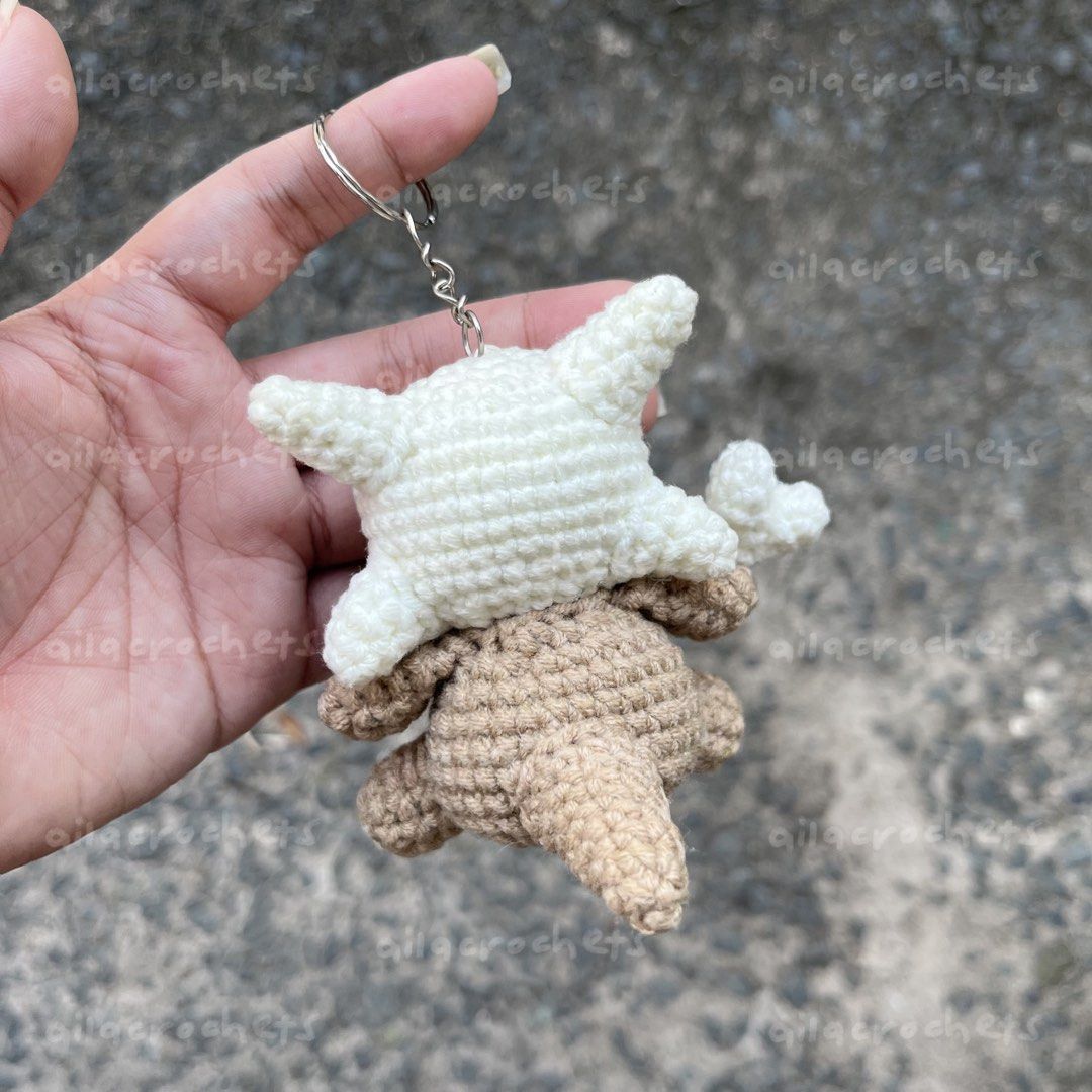 Pokemon - Cubone crochet keychain (Category: Handmade Craft) located in Pasig City. Submitted by ailacrochets (Listing ID 1465676465, Image 3). Description: – milk cotton - 3.5 to 4 inches in height – open for bulk orders mop: gcash/maribank mod: j&t/gogo xpress/sdd 📍pasig.