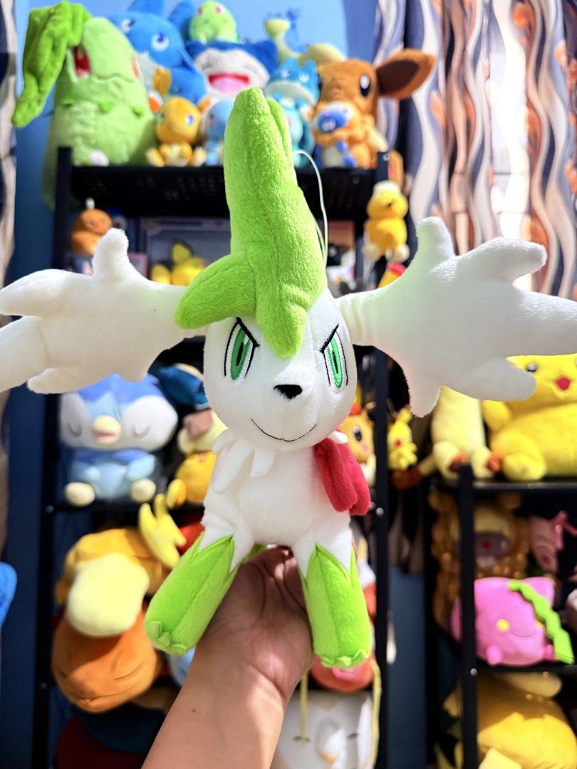 Pokemon Shaymin Plush Toy (Category: Plushies & Soft Toys) located in Cavite. Submitted by projectplushie (Listing ID 1465674193, Image 1). Description: - Authentic Shaymin Pokémon plush toy - Features a soft white body with vibrant green head and foot accents - Designed with large white wings and an adorable red flower scarf - High-quality, clean stitching and super soft fabric - Must-have collectible for Pokémon fans and plushie lovers .