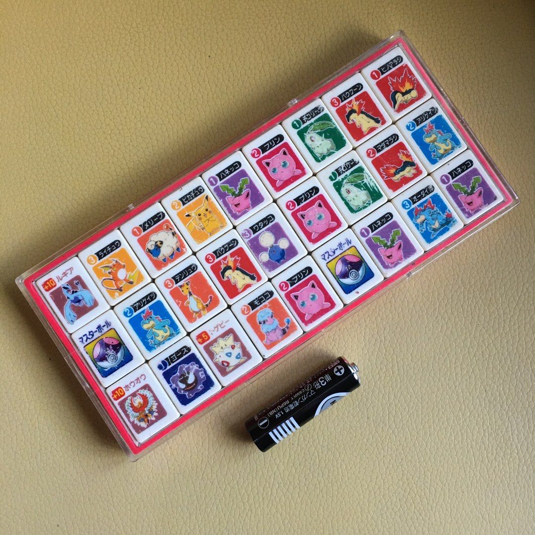Pokémon Family Ponjan Gold and Silver Set (Category: Looking For) located in Tarlac. Submitted by greatfindstrlc (Listing ID 1465586821, Image 2). Description: Donjara plastic game tiles made by TOMY, 1 set only Ponjan mahjong mini Gold and Silver Gen 2 era tiles. Vintage Japanese Board Game..