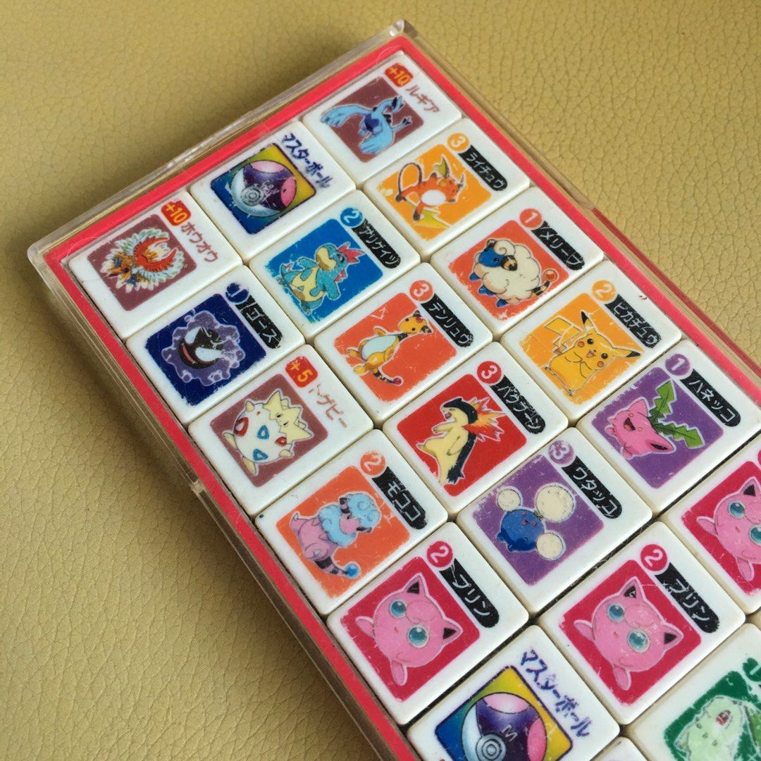 Pokémon Family Ponjan Gold and Silver Set (Category: Looking For) located in Tarlac. Submitted by greatfindstrlc (Listing ID 1465586821, Image 3). Description: Donjara plastic game tiles made by TOMY, 1 set only Ponjan mahjong mini Gold and Silver Gen 2 era tiles. Vintage Japanese Board Game..