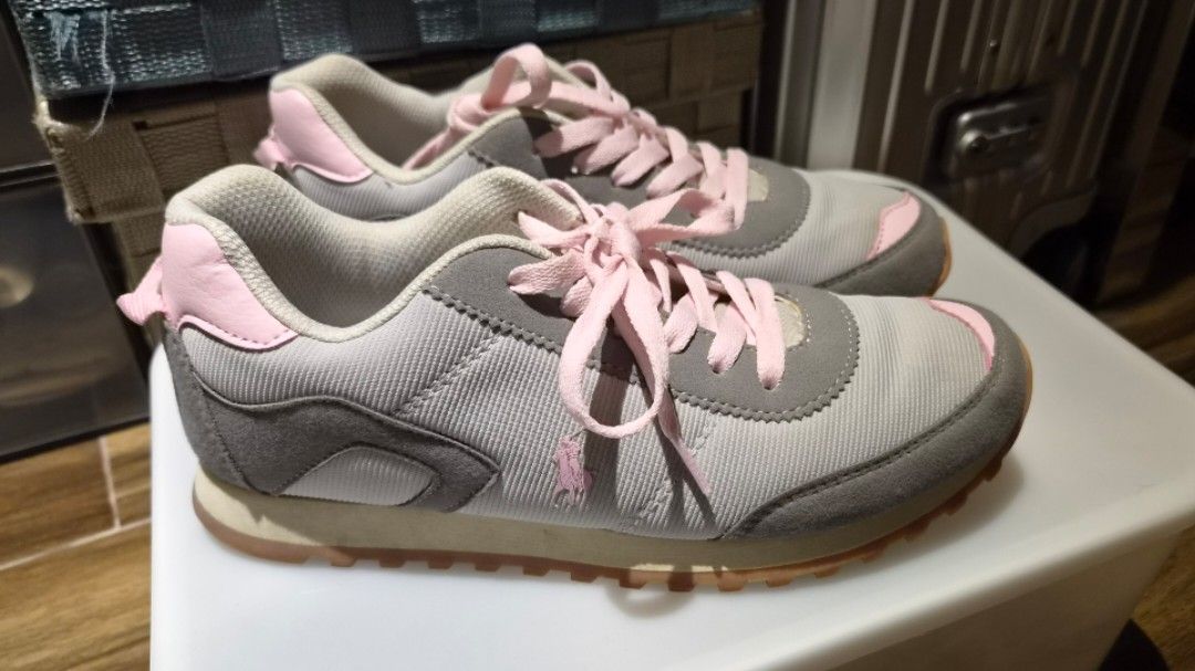 Polo Ralph Lauren Train 85 Pink/Grey (Category: Sneakers) located in Las Pinas. Submitted by nacky888 (Listing ID 1465658383, Image 1). Description: - Brand/Model: Authentic Polo Ralph Lauren Train 85 Retro Runner - Size: EU 37 / 24.3 CM - Colorway: Soft Grey / Light Pink / Gum Outsole - Source: 100% Authentic. Bought for ₱4,500 at Complex Lifestyle Store, Uptown Mall BGC (2023) - Condition: lightly used; no inclusions.