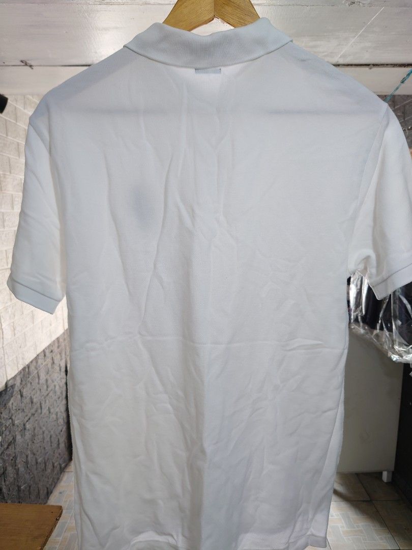 Polo sport Poloshirt tshirt thrift (Category: Tshirts & Polo Shirts ) located in Paranaque City. Submitted by emzeicool48572 (Listing ID 1465632513, Image 2). Description: Size: Medium to Large 21x27.5-29.5 Inch) Material: Cotton Color: White color rate: 9.5/10 Condition: 9.5/10 issue: cut washtag 📍Tambo Paranaque 💸Payment: Pay Maya only 📦🚚 Delivery: Lalamove or j&t (order mo book mo) No return policy Buy at your own risk Don't expect too muc