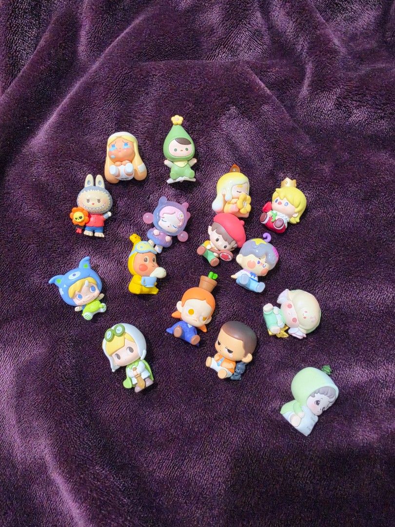 Pop Beans (Category: Designer & Blind Box Toys) located in Pasig City. Submitted by cheribomb85 (Listing ID 1465756790, Image 1). Description: - Blind box mini figure bundle featuring all items shown - Variety of characters with unique hats, outfits, and poses - Features a mix of pastel and vibrant colorful designs - Perfect for collectors looking to buy a complete set at once - All pieces pictured are included in this purchase.