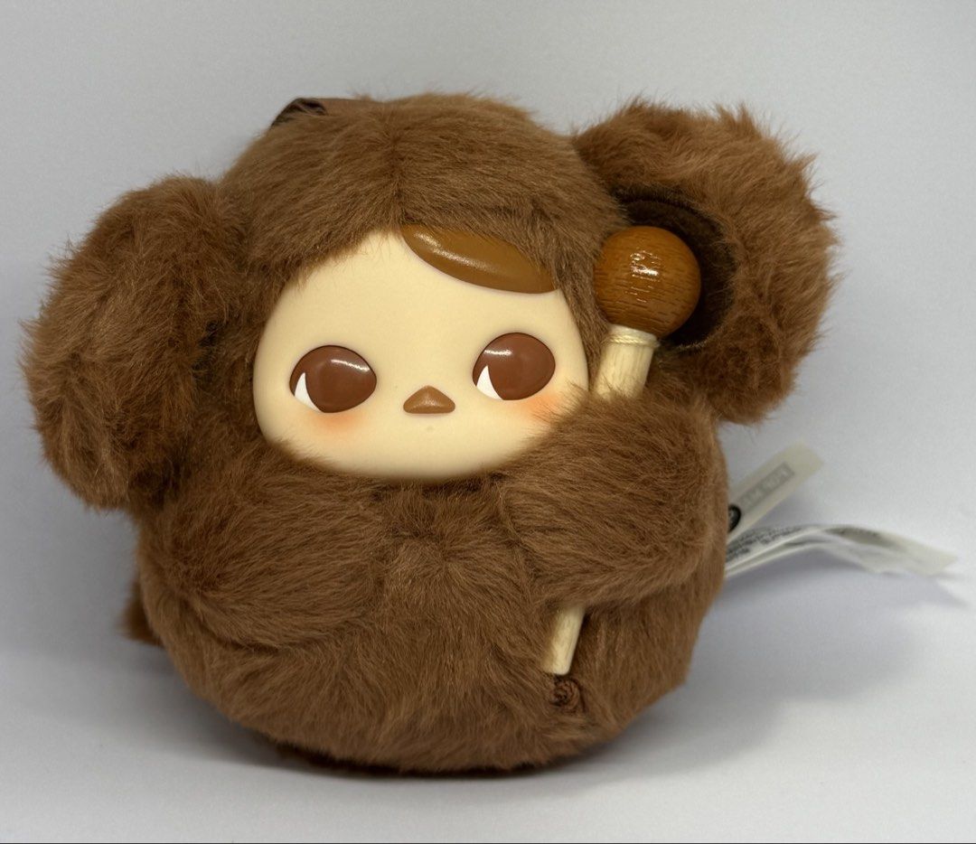 Pop Mart Pucky - Tap Tap Babies - Wisdom (Category: Plushies & Soft Toys) located in Manila. Submitted by silverfalcon_dbc769 (Listing ID 1465727206, Image 1). Description: - Authentic Pop Mart Skullpanda plush doll in brown fur - Adorable plastic face with big brown eyes and side hair tuft - Holding a tiny wooden drumstick or mallet - Soft fluffy body with large round ears - Includes original tag on the back - Clean and well-kept condition.