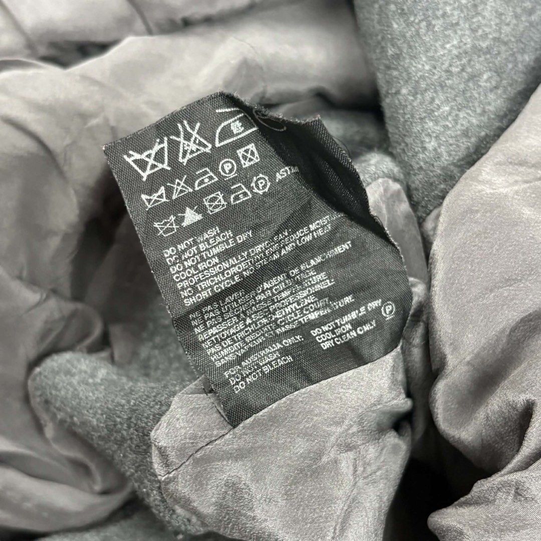 Prada - Pleated Layered Wool Trench Coat (Category: Luxury Apparel) located in Bacolod City. Submitted by classy.glamour (Listing ID 1465735330, Image 3). Description: Prada - Pleated Layered Wool Trench Coat Authentic Tagged size: 42 Size: Large Condition: Excellent Flaw: None.