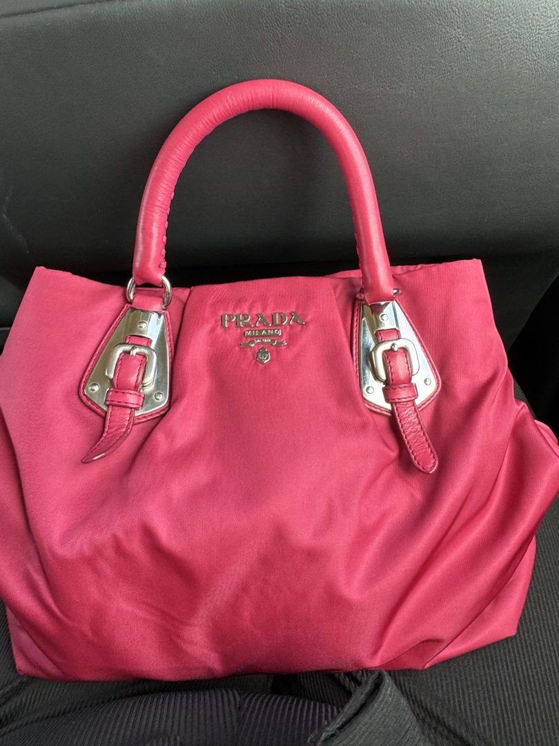 PRADA bag ( preloved) (Category: Luxury Bags & Wallets) located in Paranaque City. Submitted by iamminel (Listing ID 1465593068, Image 1). Description: Prada bag ( original) wd care card , proof of aunthenticity nice no scratches,dents no issue .