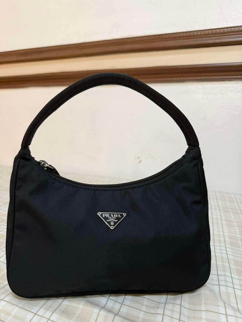 Prada Black Nylon Mini Re-Edition Shoulder Bag (Category: Luxury Bags & Wallets) located in Cavite. Submitted by yrdce (Listing ID 1465714476, Image 2). Description: Comes with Legitgrails certificate as proof of authenticity With original dustbag PM me for more detailed pics.