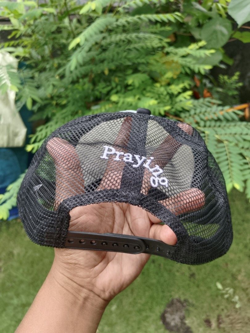 Praying Feral Trucker Hat (Category: Caps & Hats) located in Legazpi City. Submitted by genobecollectives (Listing ID 1465592328, Image 2). Description: - Brand: Praying - Style: FERAL Trucker Hat (Black & White) - Details: Bold "FERAL" print on front panel, white "Praying" embroidery on back mesh - Closure: Adjustable snapback rear - Condition: Clean all around 500 free ship.